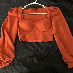 Rust orange cropped bell sleeve top